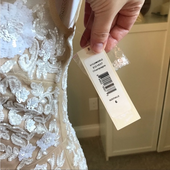beaded wedding gown new with out tags took off to clean priced to sell asap - Picture 5 of 8